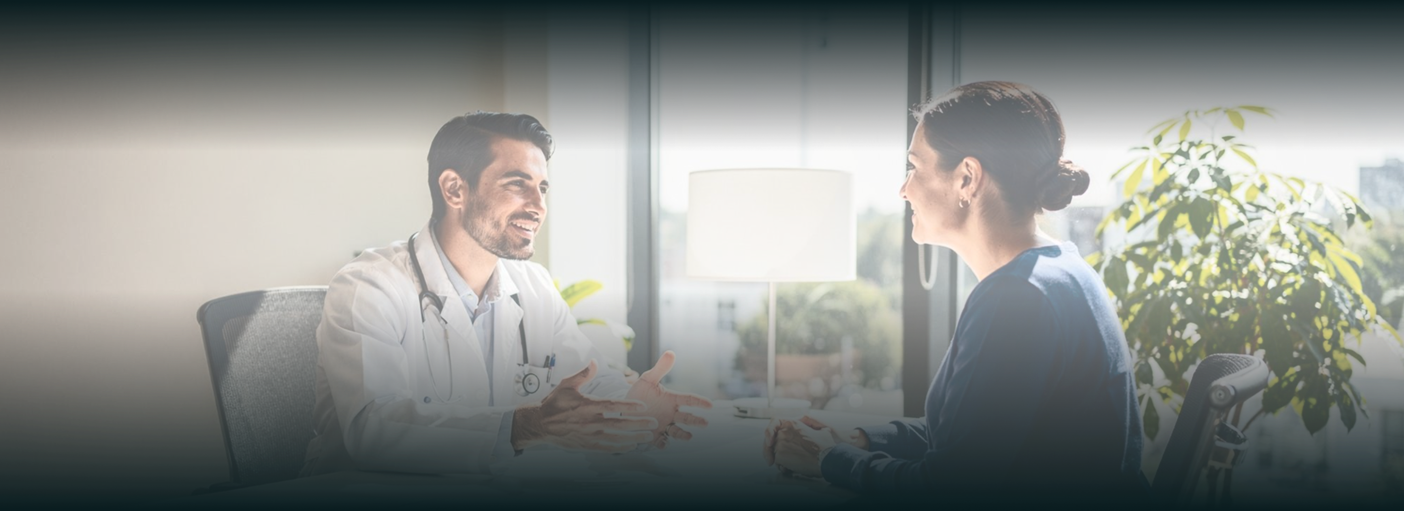 Doctor consulting with patient